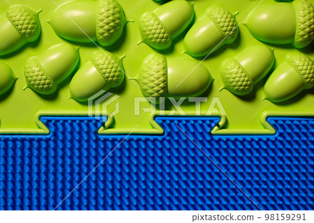 Orthopedic mats view from above. Bright colorful multicolored mats to prevent flat feet and foot massage. 98159291