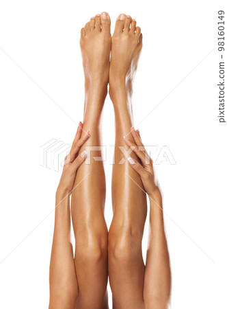 Legs, feet and woman with skin and hands with epilation, beauty and pedicure with manicure against white background. Spa treatment, wellness and cosmetic care, healthy skincare with natural cosmetics Legs, feet and woman with skin and hands with epilation, beauty and pedicure with manicure against white background. Spa treatment, wellness and cosmetic care, healthy skincare with natural cosmetics 98160149