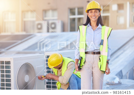 Air conditioner, building maintenance and teamwork with tablet, smile and development with engineer team. Engineering man, repair woman and digital tech in portrait with collaboration for ac repair 98161415