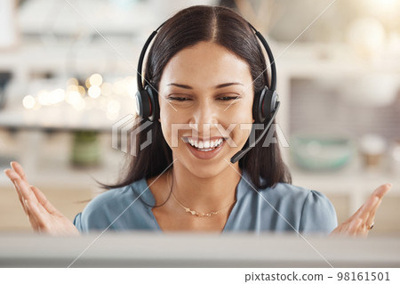 Call center, telemarketing or customer support agent consulting clients with headset in office. Happy employee working on ecommerce sales, online consultation and customer service crm with technology 98161501