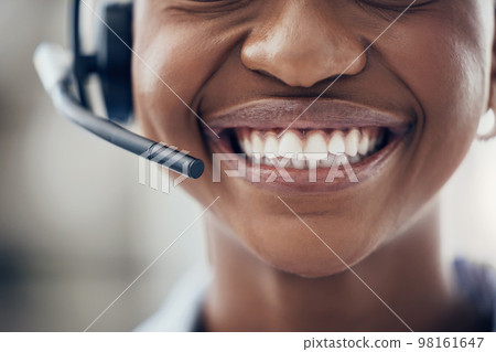 Black woman, teeth and smile with headset in call center, customer service or contact us at the office. Closeup of happy African American female consultant with toothy mouth smiling for telemarketing 98161647