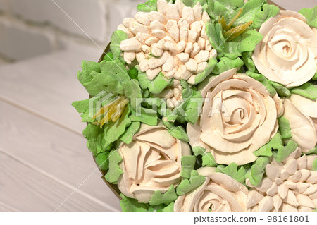 Marshmallow bouquet. Bouquet of zephyr flowers. On a white background. Close-up. Marshmallow bouquet. Bouquet of zephyr flowers. On a white background. Close-up. 98161801
