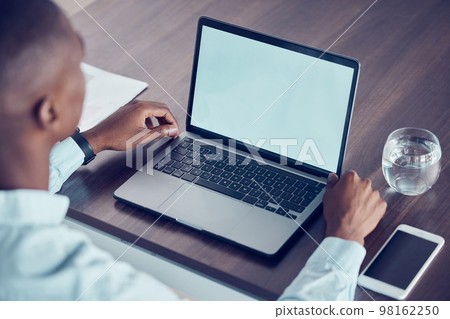 Mockup screen, advertising and businessman on a laptop for business, networking and communication in an office at work. Computer of corporate worker for marketing, branding and mock up space Mockup screen, advertising and businessman on a laptop for business, networking and communication in an office at work. Computer of corporate worker for marketing, branding and mock up space 98162250