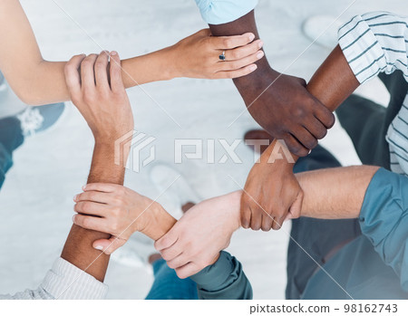 Wrist hands, team building and business people support diversity, group and collaboration, cooperation and community mission. Above solidarity, partnership and motivation of goals, trust and teamwork 98162743