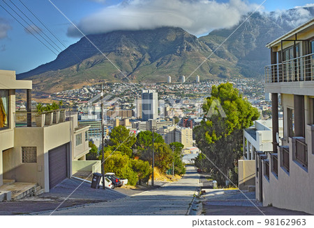 Invest in Cape Town property. Cape Town seen from the hill of a residential area. Invest in Cape Town property. Cape Town seen from the hill of a residential area. 98162963