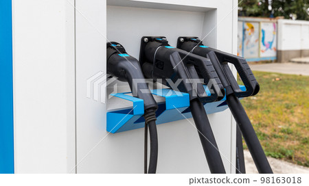 Electric car charging station. Hybrid car Electric charger station Electric car charging station. Hybrid car Electric charger station 98163018