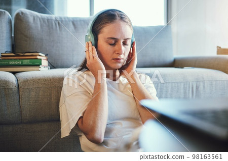 Student, stuyding and headphones for relax, mental health and wellness music for higher education. Girl, university student and break from studies for education and knowledge and comfort Student, stuyding and headphones for relax, mental health and wellness music for higher education. Girl, university student and break from studies for education and knowledge and comfort 98163561