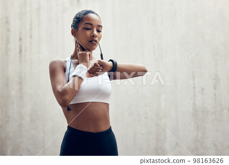 Smartwatch, fitness and thinking black woman check time running results or training workout progress on wall mock up marketing. Sports athlete with smart watch for exercise goal or idea mock up 98163626