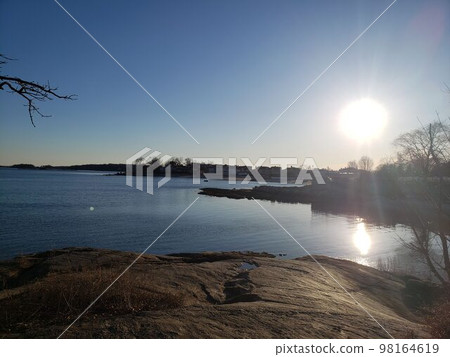 Seaside residential area and sunset 98164619