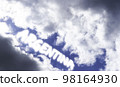 Lettering Argentina in the summer sky. Cumulus clouds on a blue background. Partly cloudy. 98164930