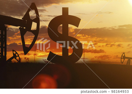 Sing ruble and oil sign against backdrop of beautiful sunset.  98164933