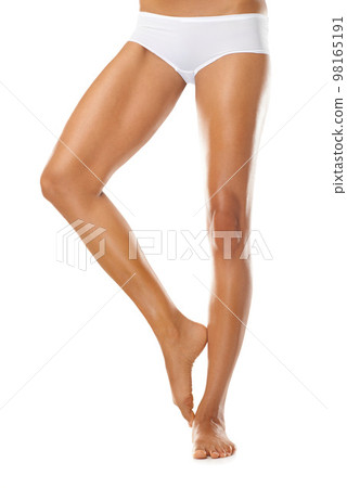 Woman, skincare and legs for beauty, white background and isolated studio. Closeup, cosmetics model and leg hair removal, epilation and body wellness from laser salon, aesthetic glow or botox results Woman, skincare and legs for beauty, white background and isolated studio. Closeup, cosmetics model and leg hair removal, epilation and body wellness from laser salon, aesthetic glow or botox results 98165191