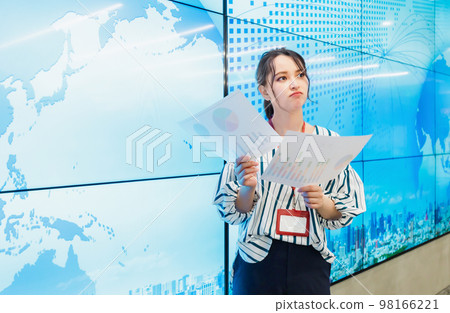 Young woman working in the office Young woman working in the office 98166221