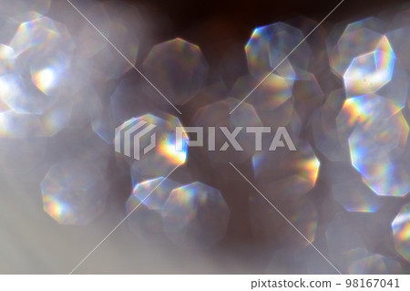 Abstract background of a large rainbow bokeh. 98167041