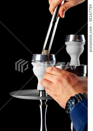 Shisha hookah with hot coals on black background Shisha hookah with hot coals on black background 98167784