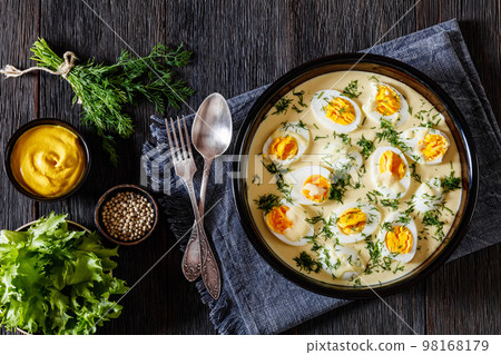 Senfeier, hard boiled eggs in creamy mustard sauce 98168179