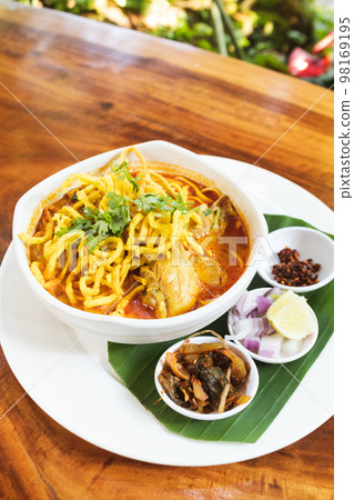 Northern Thai Food, Rice Noodles iN Coconut Curry Soup With Chicken. 98169195
