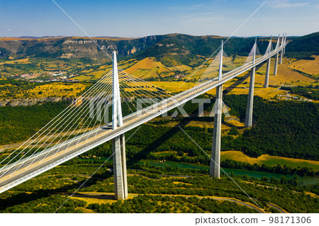 Cable-stayed Millau Viaduct spanning Tarn River valley, France Cable-stayed Millau Viaduct spanning Tarn River valley, France 98171306