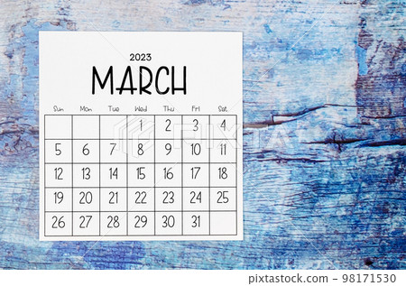 The March 2023 Monthly calendar for 2023 year on old blue wooden background. 98171530