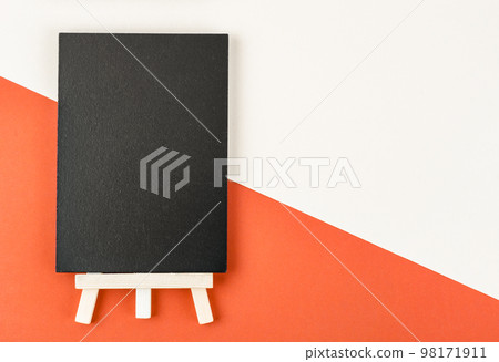 A empty blackboard with a wooden frame on beautiful background for your text or message. A empty blackboard with a wooden frame on beautiful background for your text or message. 98171911
