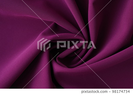 Shaped purple fabric as background or design element. 98174734