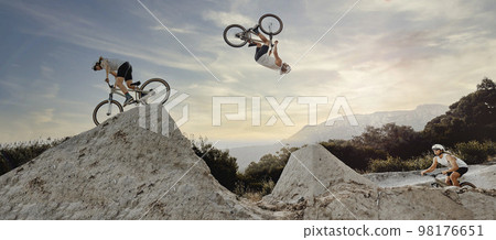 Bmx cyclist, fitness or stunt jump air performance on Australian track or nature park trail in cycling exercise or training. Extreme sports, danger risk or mountain bike man in energy freedom workout Bmx cyclist, fitness or stunt jump air performance on Australian track or nature park trail in cycling exercise or training. Extreme sports, danger risk or mountain bike man in energy freedom workout 98176651