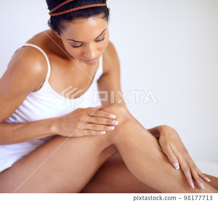 Woman, legs and natural skincare for hair removal, wellness or laser beauty. Female, leg and healthy skin care at home for body cosmetics, shine and epilation of soft aesthetic, glow or clean results Woman, legs and natural skincare for hair removal, wellness or laser beauty. Female, leg and healthy skin care at home for body cosmetics, shine and epilation of soft aesthetic, glow or clean results 98177713