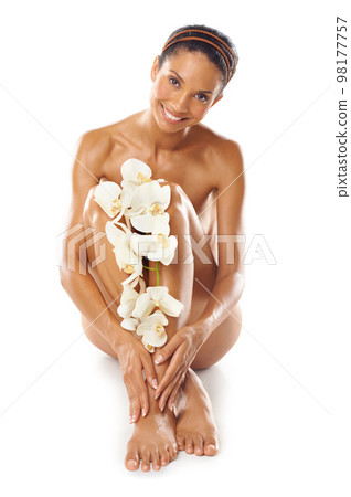 Portrait, beauty and skincare of woman with flowers in studio on a white background mock up. Floral cosmetics, organic makeup and female model with orchids on legs for skin treatment and body care. Portrait, beauty and skincare of woman with flowers in studio on a white background mock up. Floral cosmetics, organic makeup and female model with orchids on legs for skin treatment and body care. 98177757