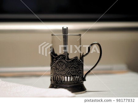 Metal coaster as a retoro relic of the Russian railway. Use the services on the road. 98177832