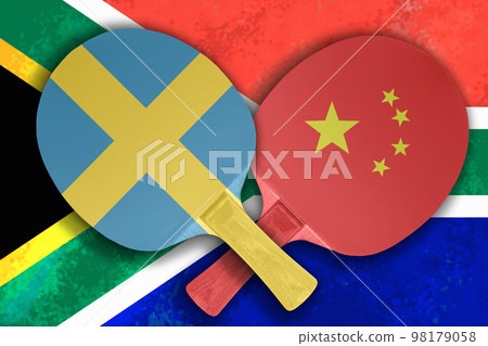 Two tennis rackets on the background of the flags of Sweden and China 98179058
