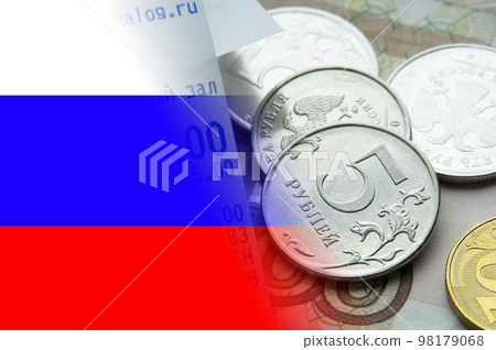 Stacks of coins on the background of the flag of Russia. Stacks of coins on the background of the flag of Russia. 98179068