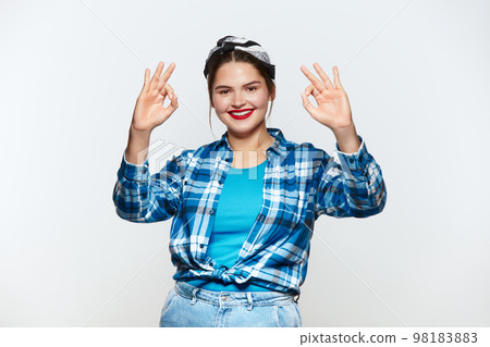 Smiling Woman Ok Gesture Isolated. Girl Standing and Showing Ok Sign Gesture Smiling Woman Ok Gesture Isolated. Girl Standing and Showing Ok Sign Gesture 98183883
