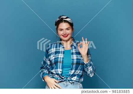 Smiling Woman Ok Gesture Isolated. Girl Standing and Showing Ok Sign Gesture Smiling Woman Ok Gesture Isolated. Girl Standing and Showing Ok Sign Gesture 98183885