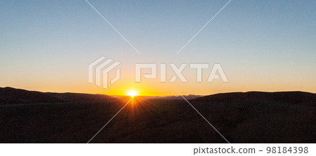 Climbing Dune 45 at sunrise Climbing Dune 45 at sunrise 98184398