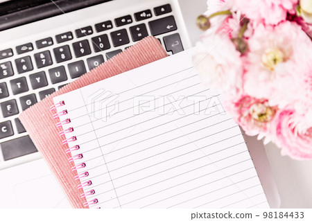 Feminine desktop with gold and pink stationery including a keyboard and mouse Feminine desktop with gold and pink stationery including a keyboard and mouse 98184433
