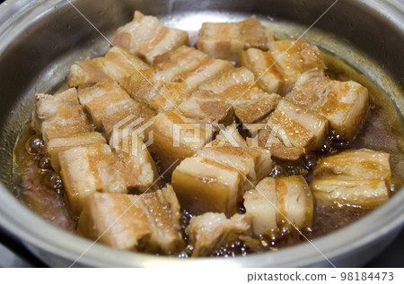 Rafute (braised pork belly) being cooked Rafute (braised pork belly) being cooked 98184473