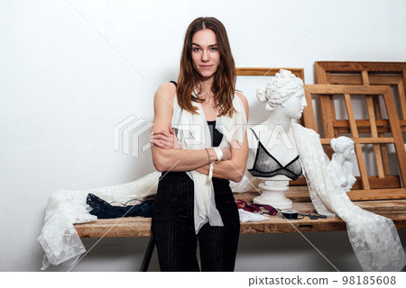 Woman lingerie designer at her workplace Woman lingerie designer at her workplace 98185608