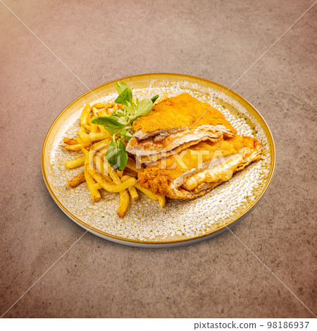 Homemade breaded pork chop 98186937