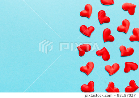 Valentine day background with red hearts, top view with copy space Valentine day background with red hearts, top view with copy space 98187027