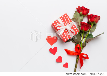 Valentine's day composition with rose flower, red heart and gift boxes on table. mother day and birthday greeting, copy space, top view 98187358