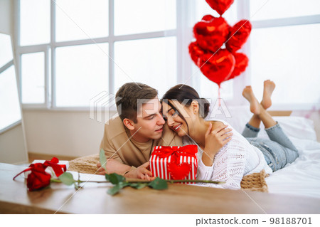 Valentine's Day concept. Happy couple in love with. Young loving couple celebrating Valentine's Day 98188701