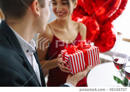 Valentine's Day concept. A loving couple celebrating Valentine's Day in the restaurant. 98188707