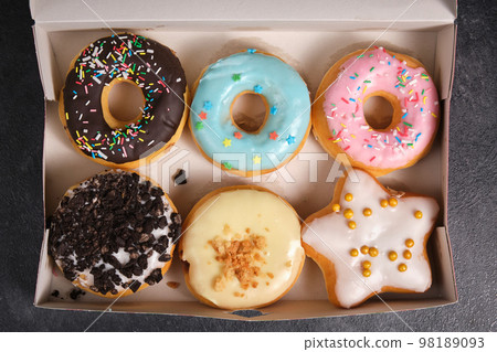 box with a variety of donuts box with a variety of donuts 98189093