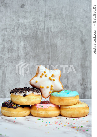 a stack of various donuts a stack of various donuts 98189105