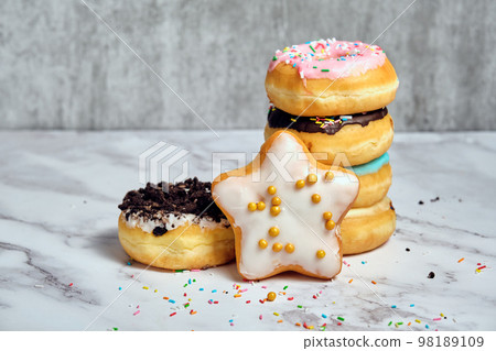 a stack of various donuts 98189109