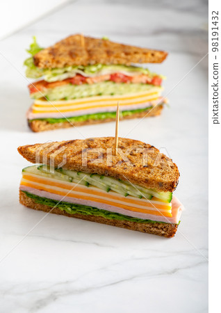High Sandwich with Ham and Cheese 98191432