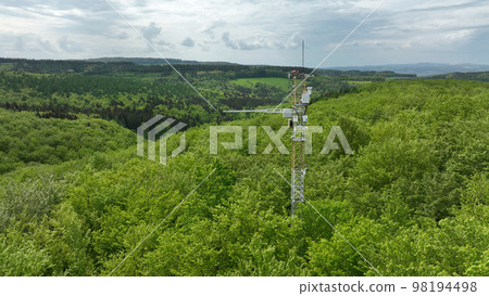 Station science research drone aerial atmospheric weather meteorology eddy, measuring ozone O3, carbon methane CH4, carbon dioxide CO2, nitrogen oxides N2O, mountain beech Fagus Europe 98194498