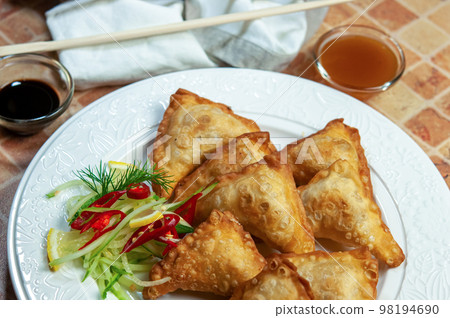Fried dumplings. Wontons. 98194690
