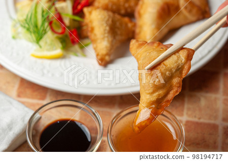 Asian fried dumplings. Gyoza, jiaozi or wonton. 98194717