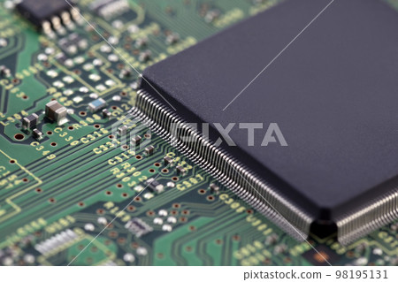 Green circuit board with large computer processor chip Green circuit board with large computer processor chip 98195131